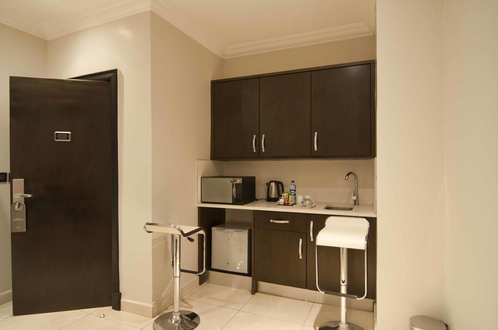L'Eola Suites Abuja Zimmer foto